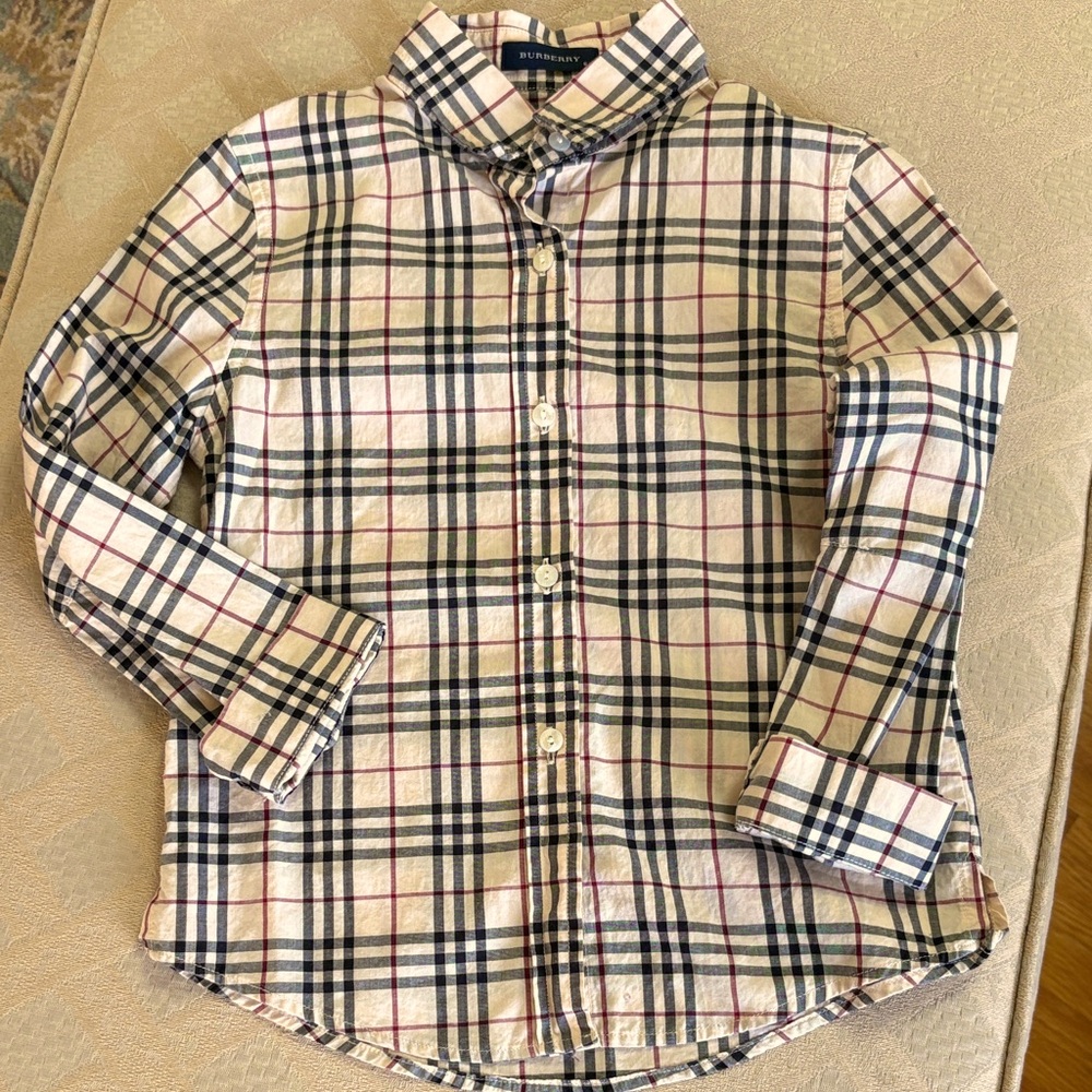 Authentic Burberry shirt. Size 6 but I’ve listed as a 3-4.